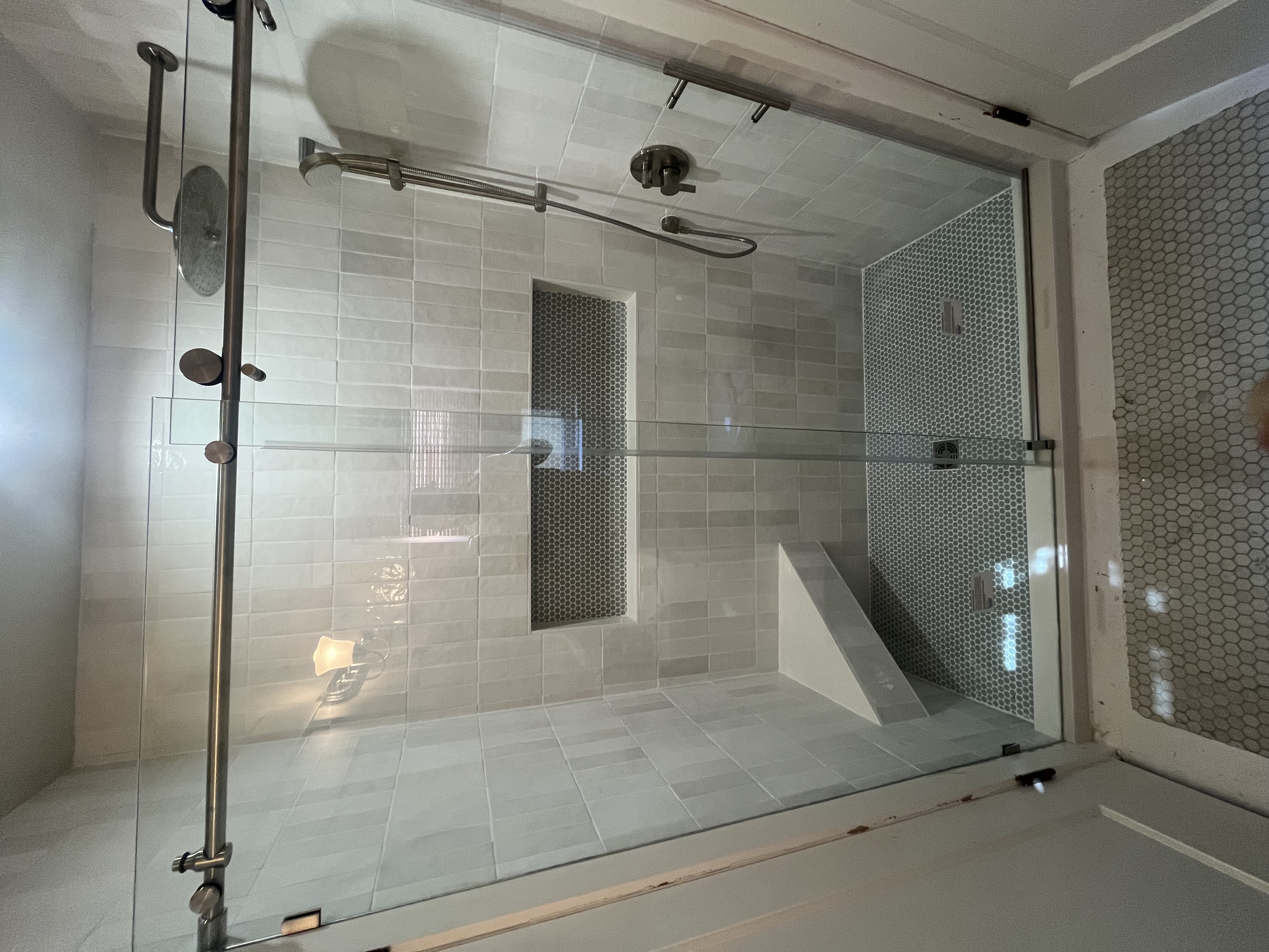 Grey penny tile shower