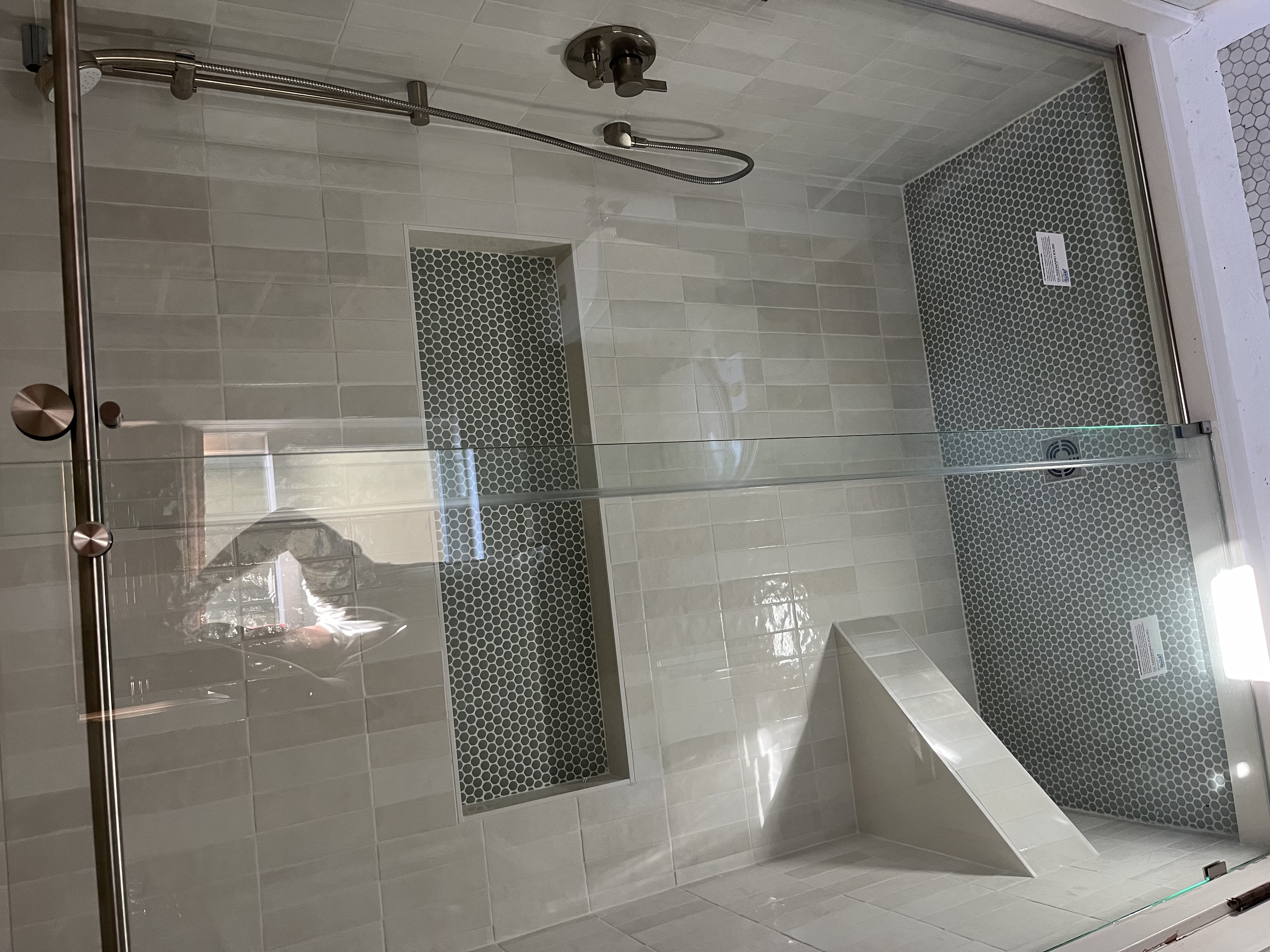 Grey penny tile shower detail