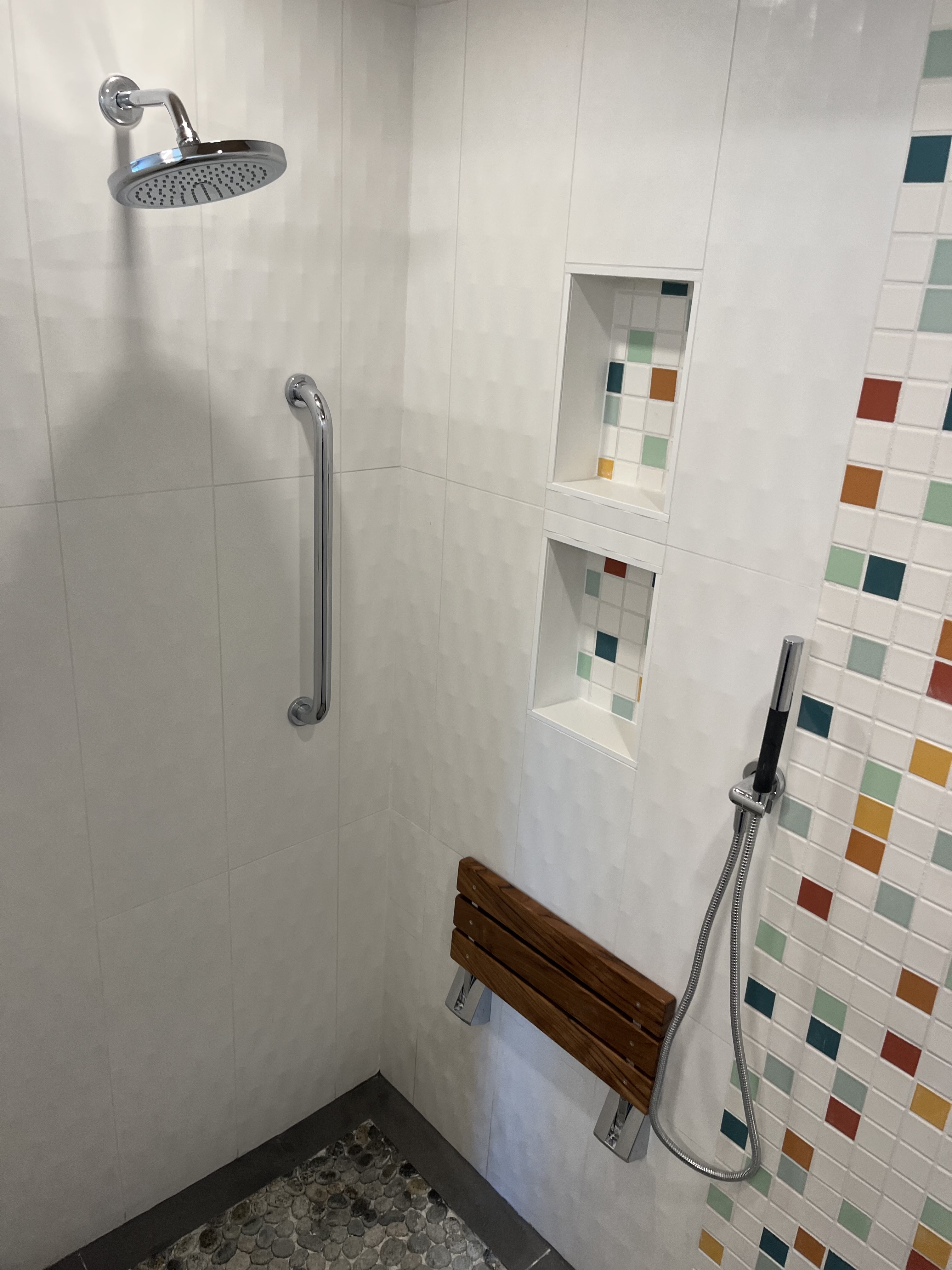 Accessibility shower with teak seat
