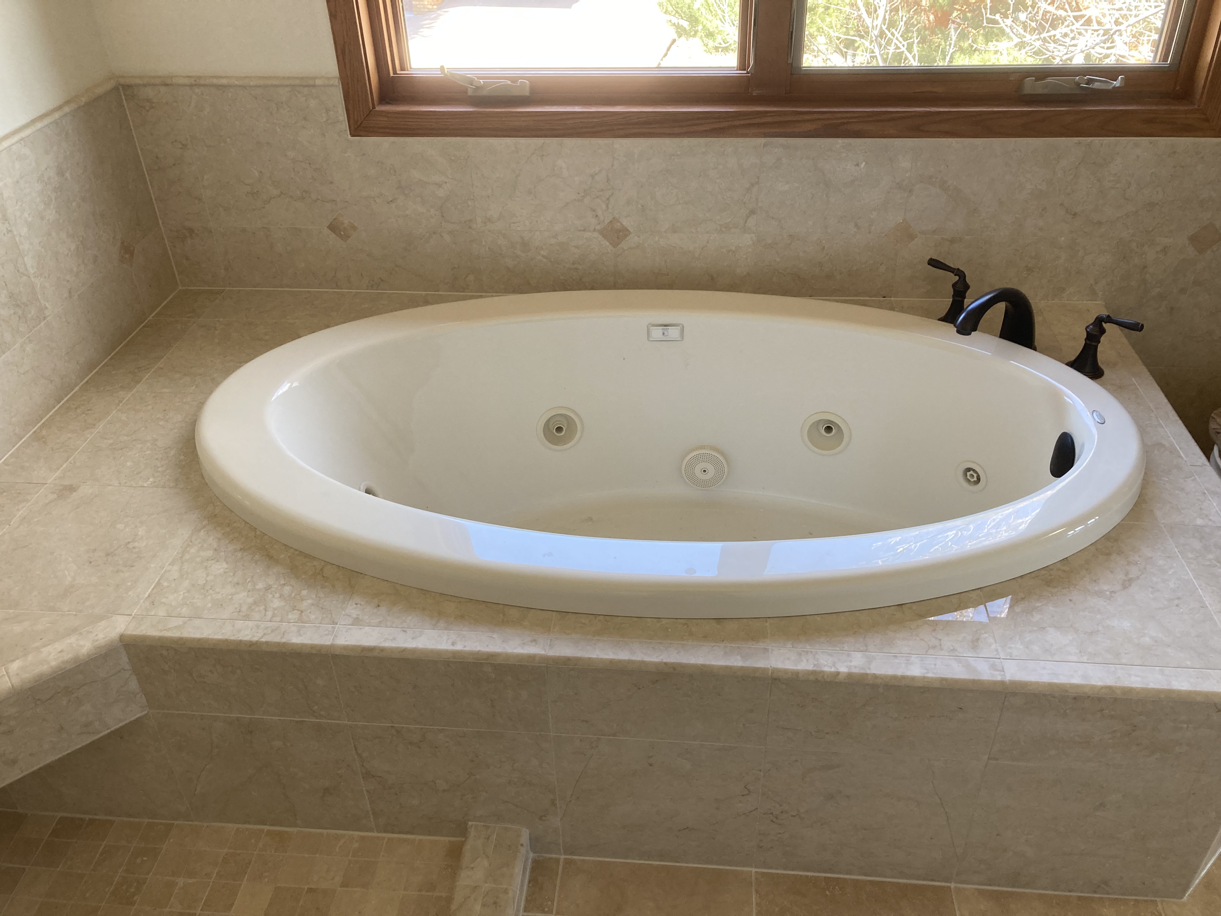 Jetted tub surround