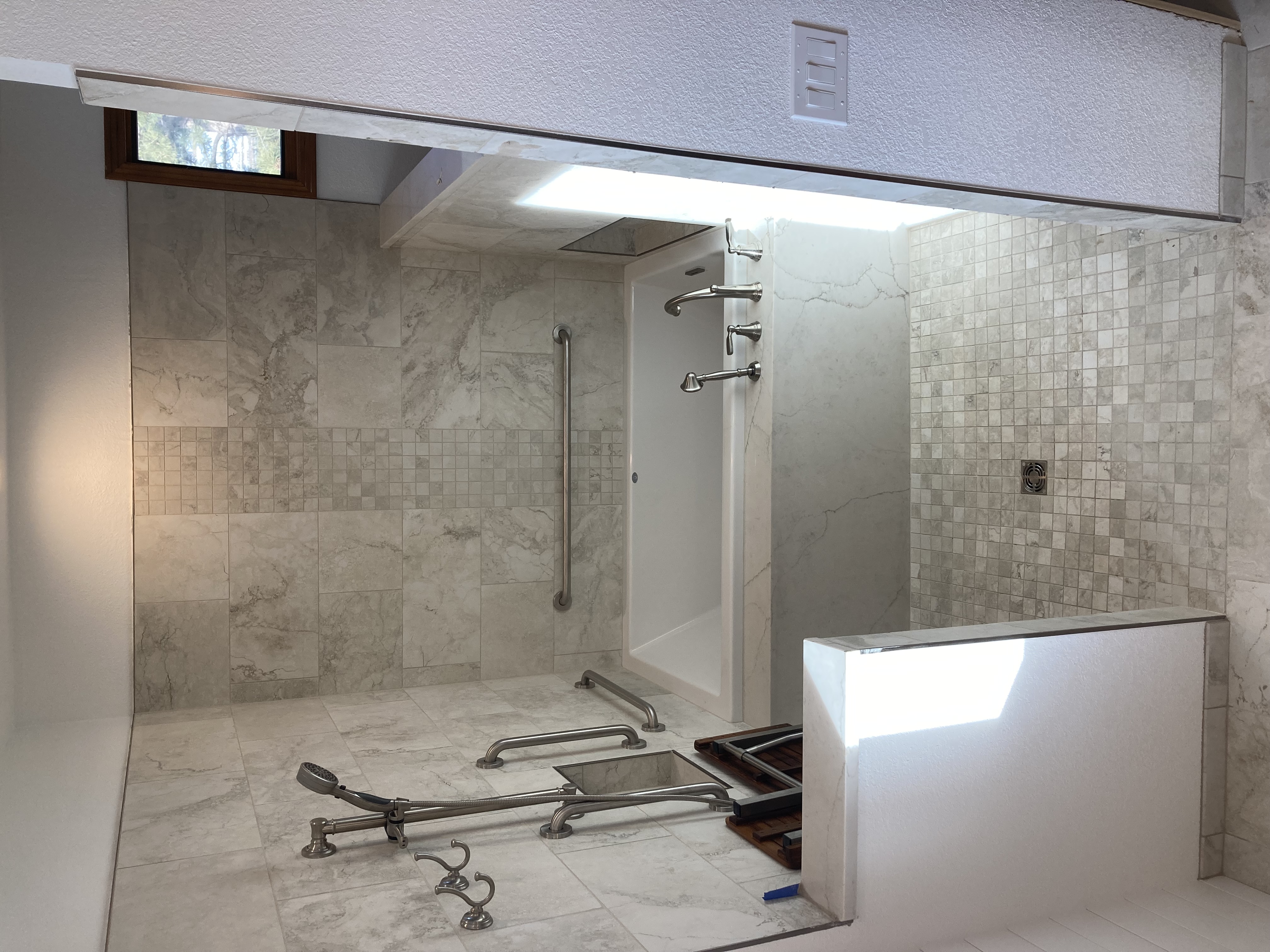 Marble accessibility wet room with tub
